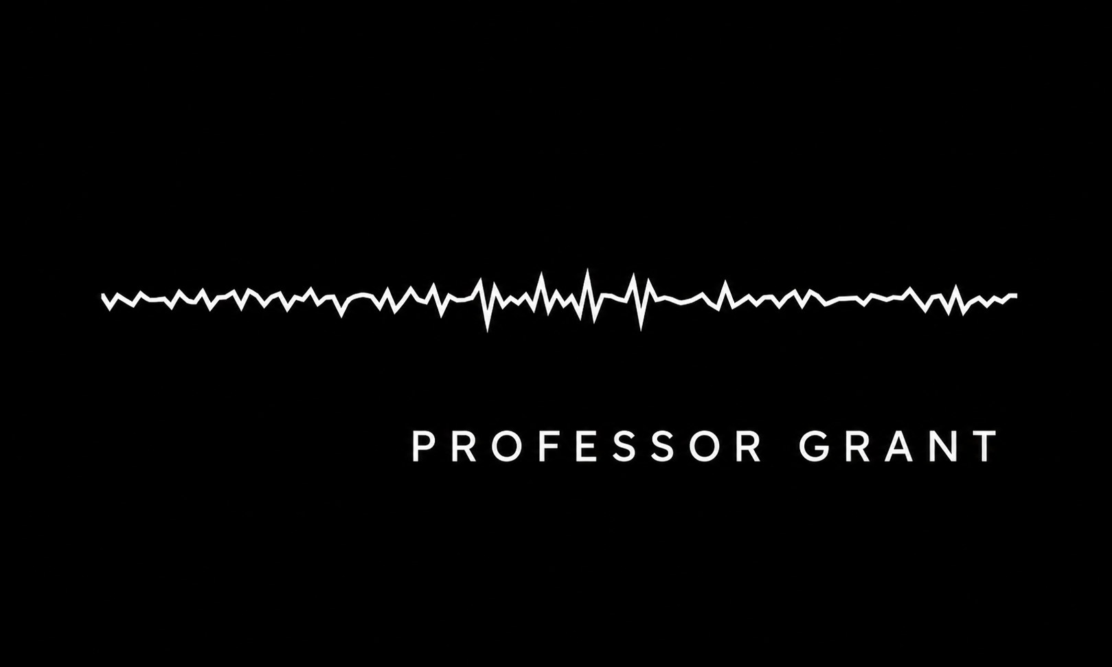 Grant speaking: an audio waveform under the words Professor Grant